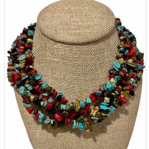 Chip bead necklace featuring turquoise, coral, tiger's eye, and onyx stones
